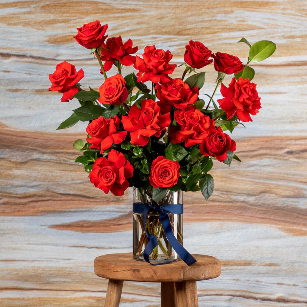 Red Ninas Roses in a glass vase available at If The Florist Maroubra